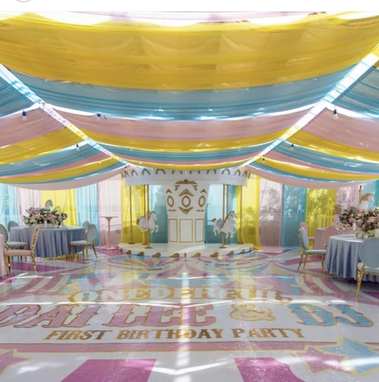 Pastel carousel first birthday with custom dance floor